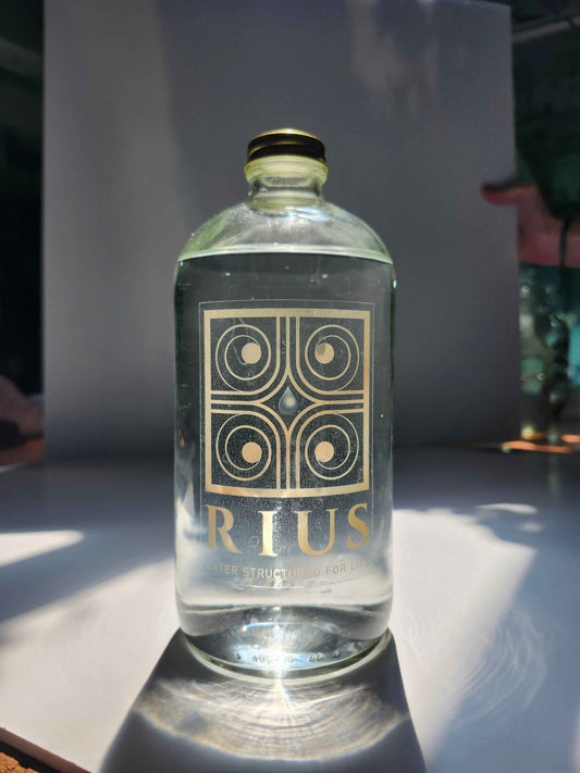 Rius structured water 34oz glass bottle, bottled in Denver Colorado