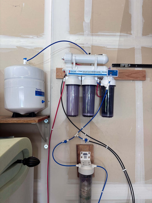 Complete structured water system with reverse osmosis and Crystal Charging Chamber installed under a sink